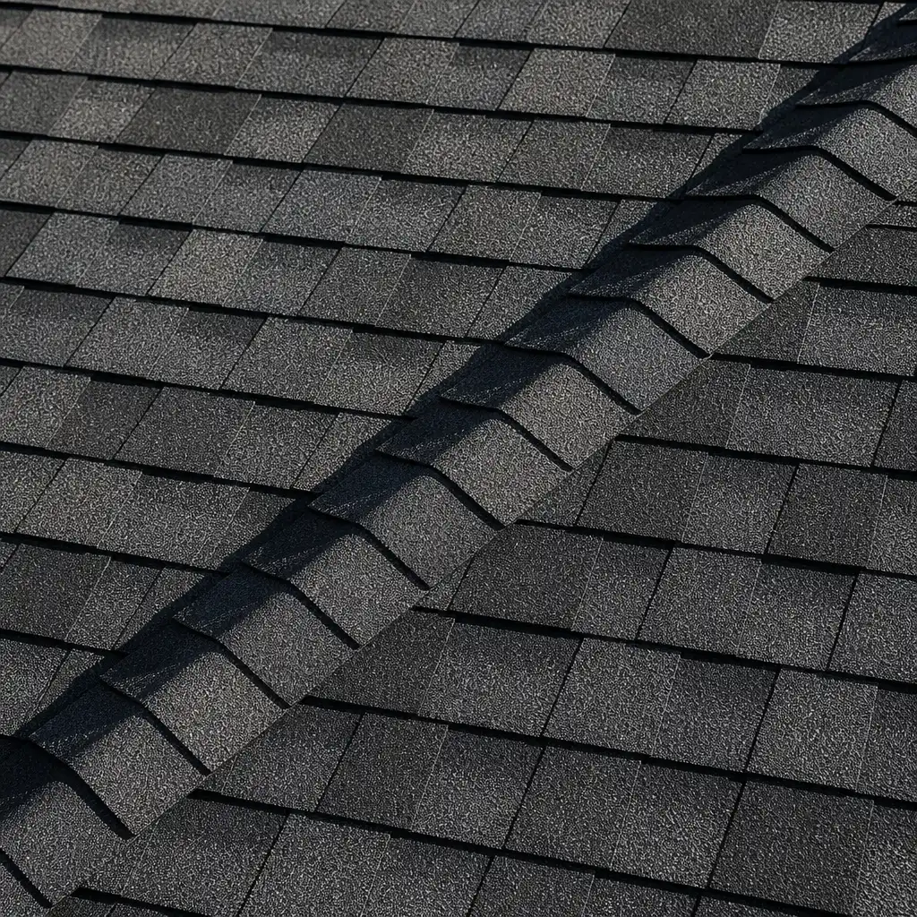 Installer setting a new seamless gutter along a roofline